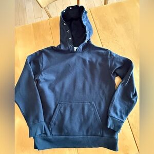 Vans X Sandy Liang hooded sweatshirt with silver metal design around hood.